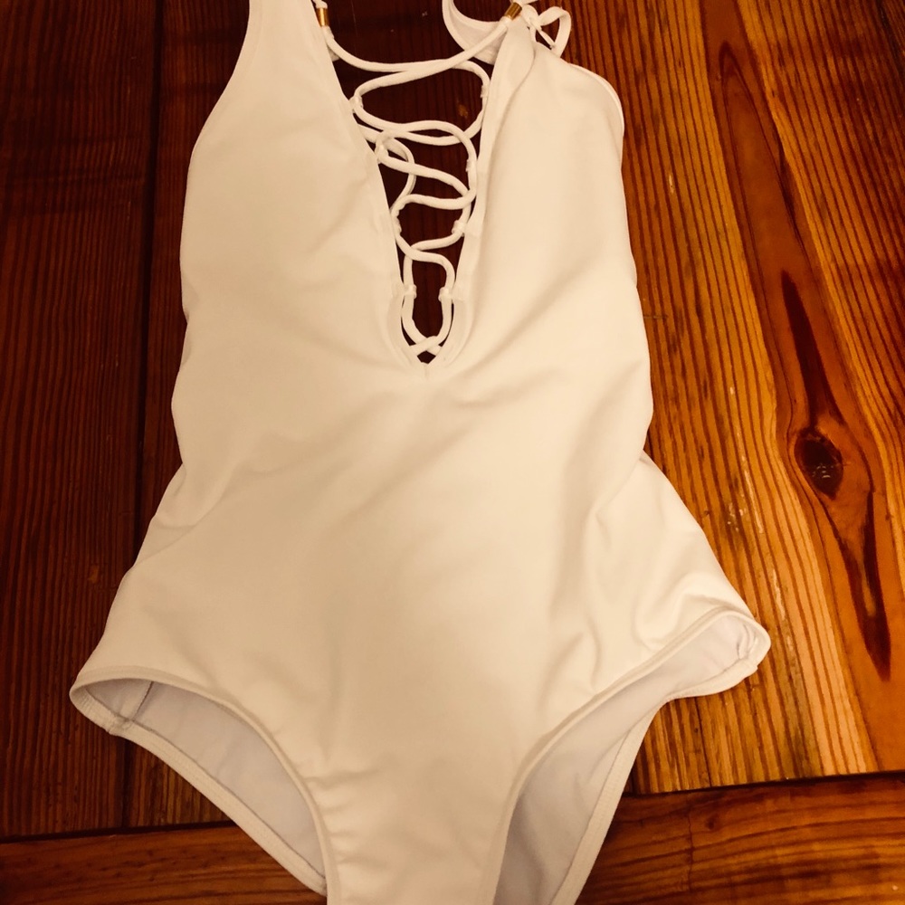 Everything but water one piece by Jessika Allen
